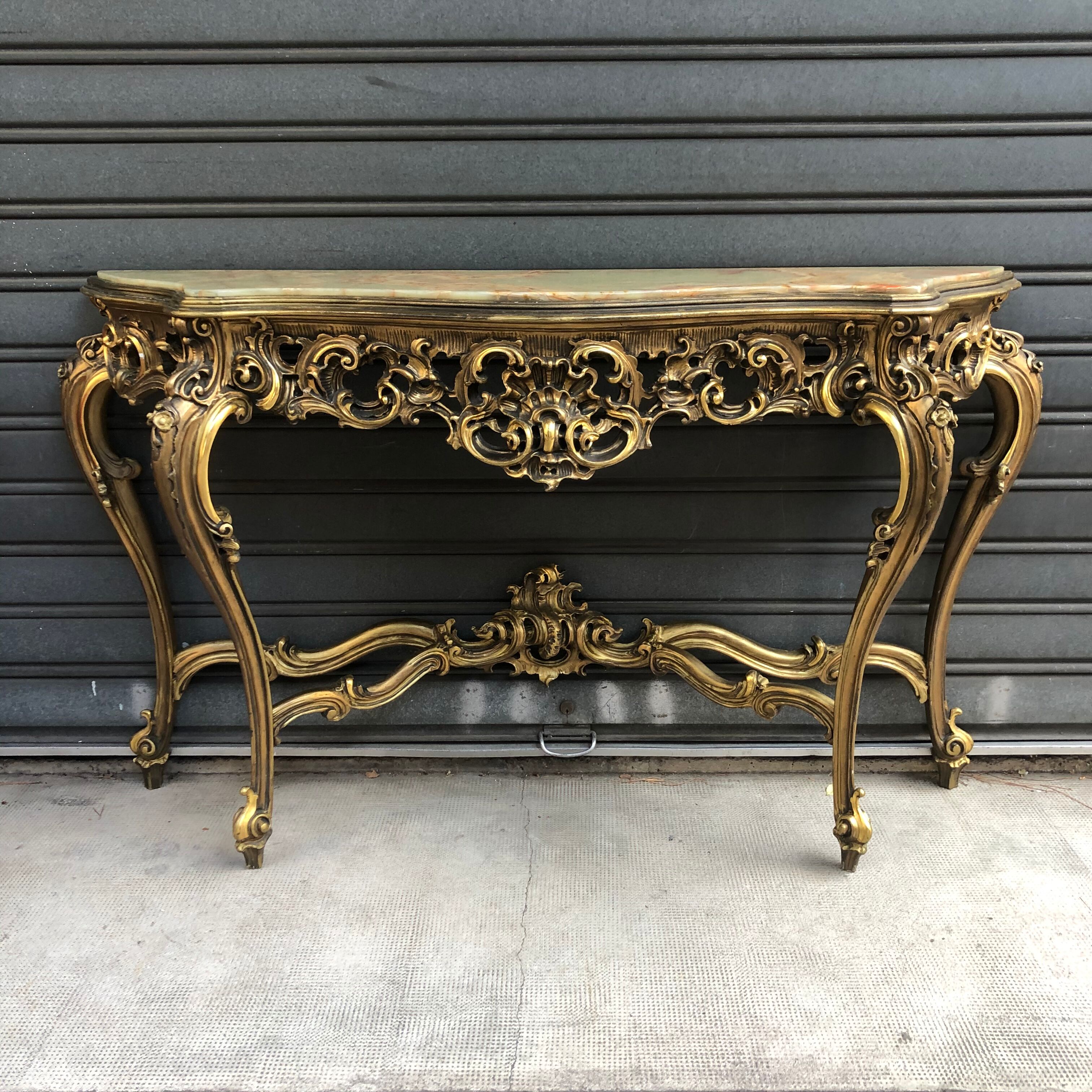 Golden wooden console on onyx Venetian baroque style