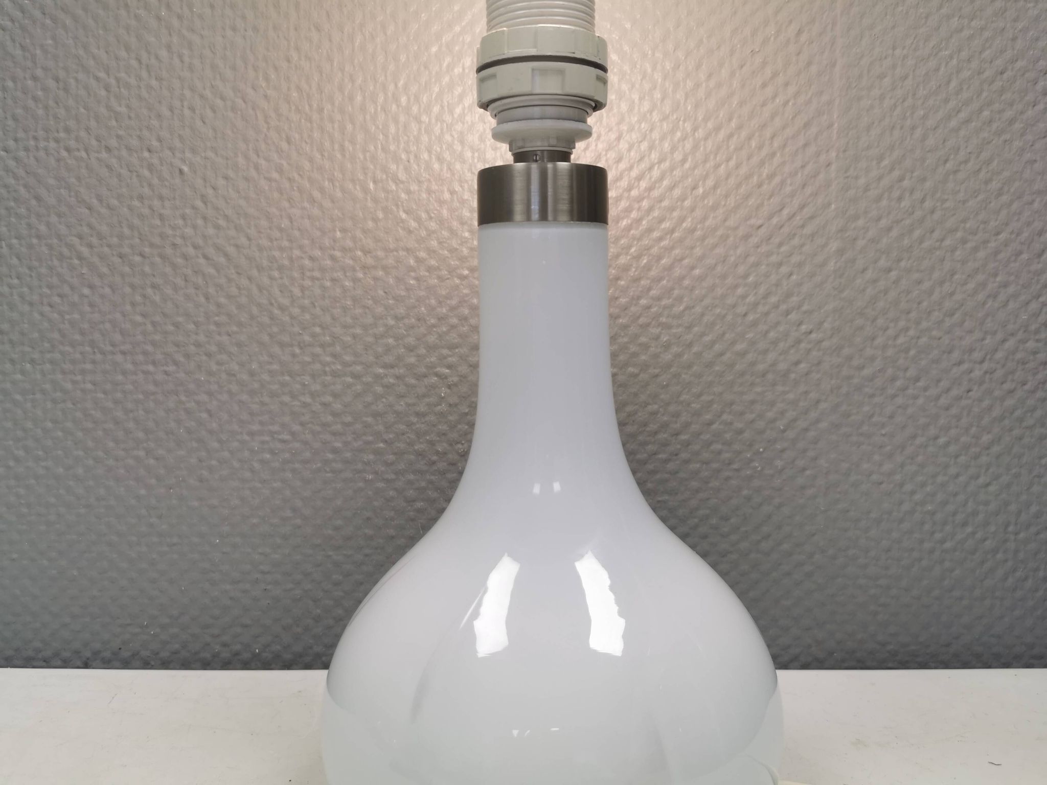 Helios table lamp, teardrop shaped, made of white opal glass. 1986 Denmark