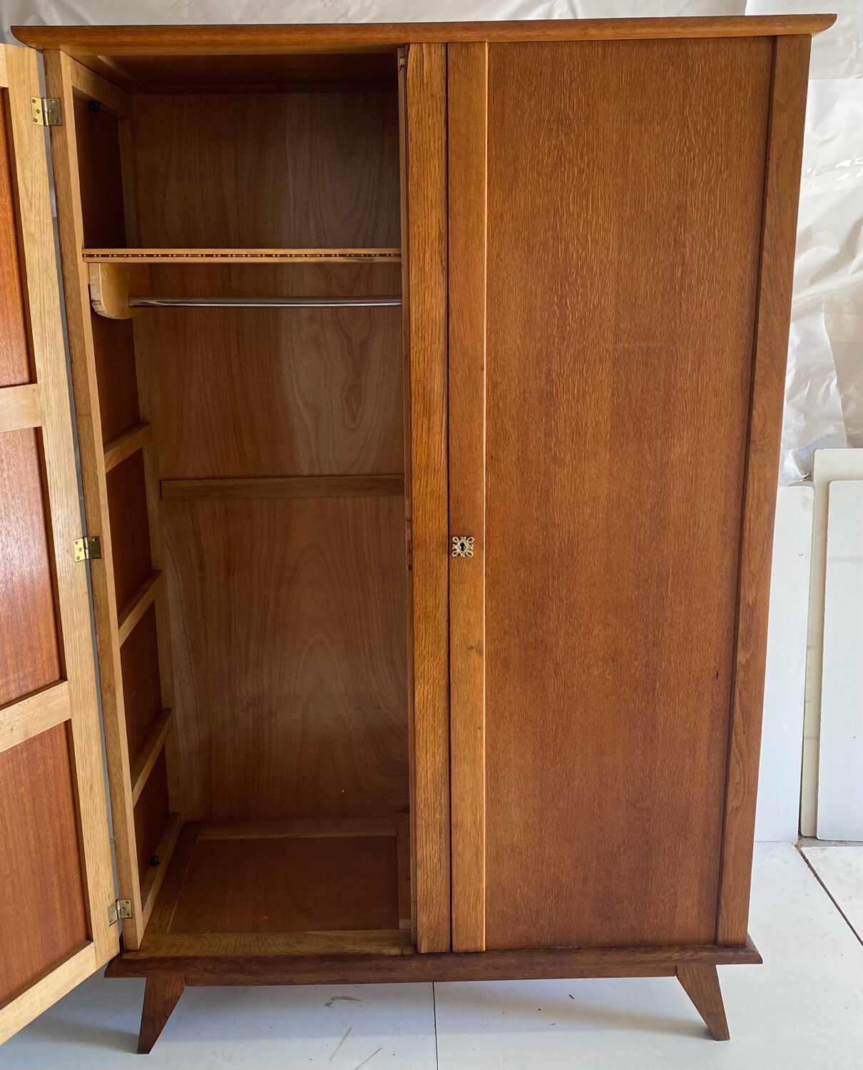 Vintage cupboard with compass feet