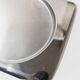 1990s vintage stainless steel platter, rectangular with an oval indentation, minimalist modern design.