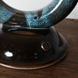 Porcelain lamp with its appearance in the shape of a round