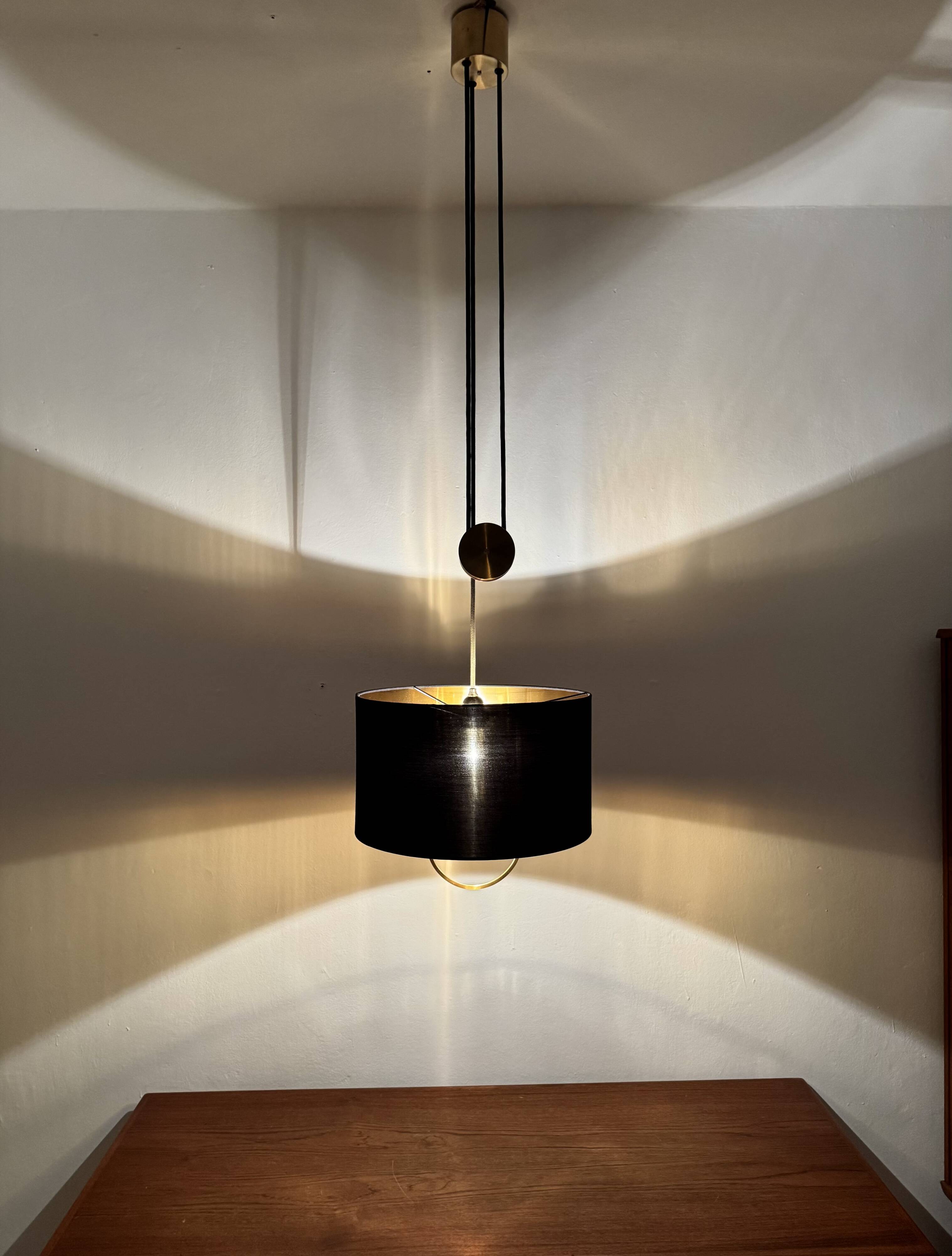 Lampe à pendentif Jo-Jo réglable par Florian Schulz