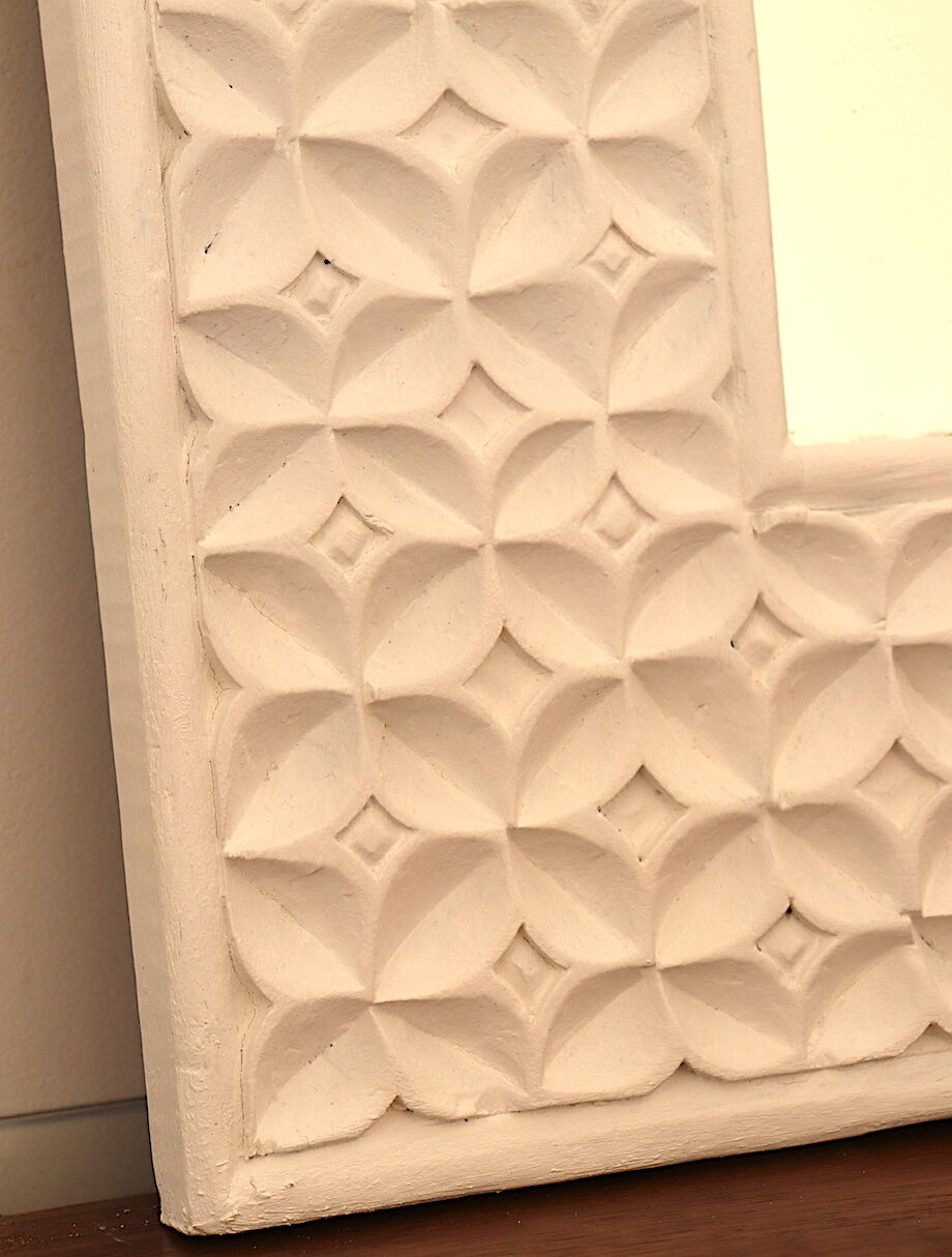 White mirror with carved flowers