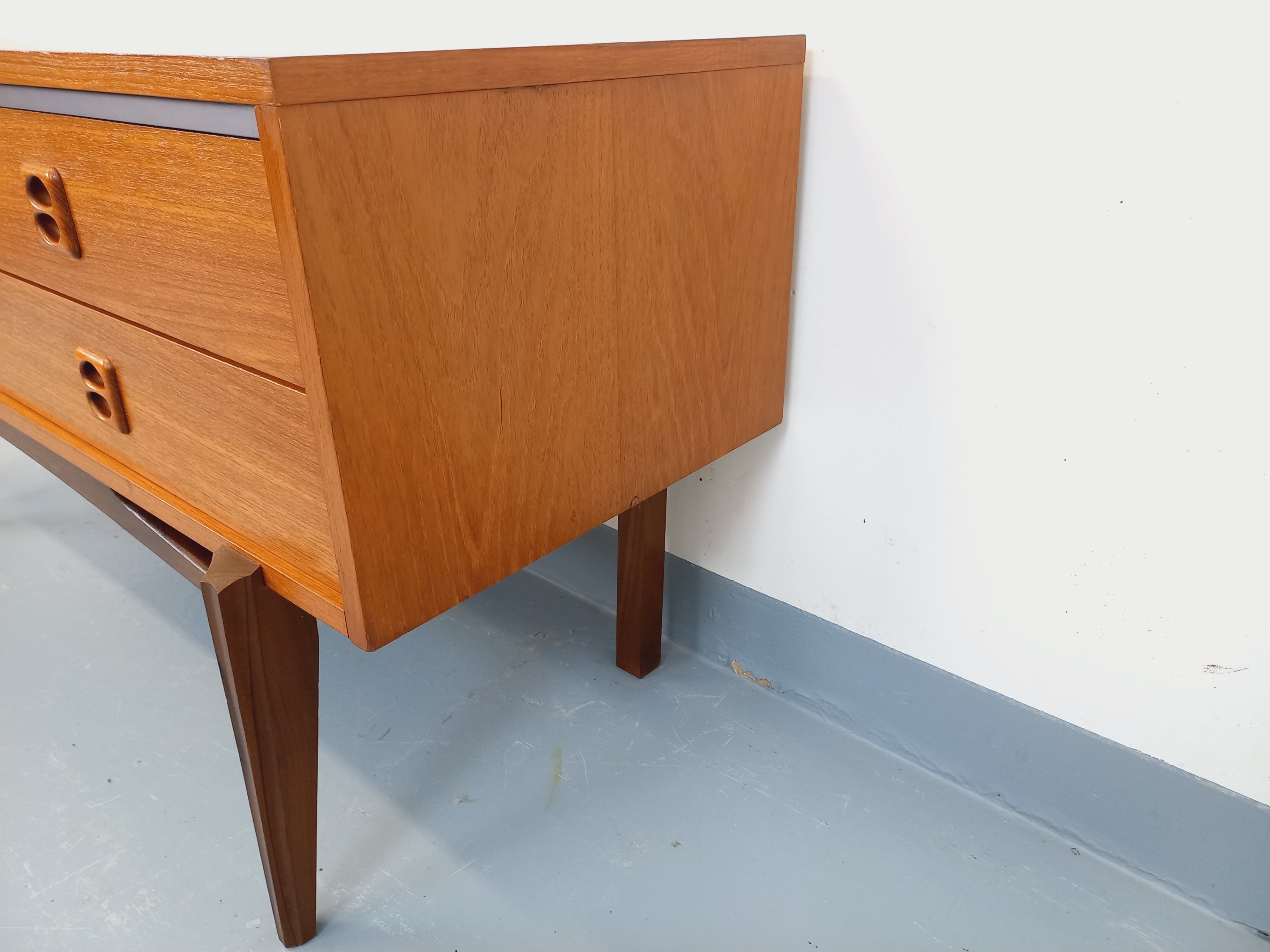 Small vintage Scandinavian teak sideboard from the 1960s.