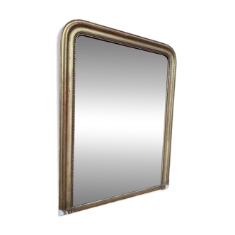 Miroir époque Louis Philippe à la feuille d'or.