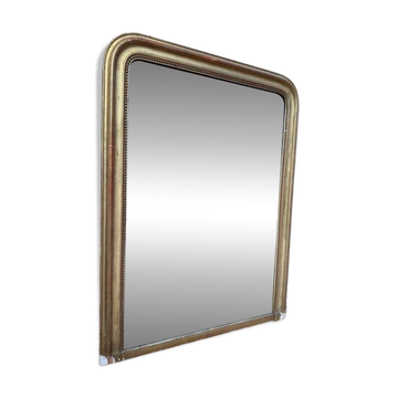 Miroir époque Louis Philippe à la feuille d'or.