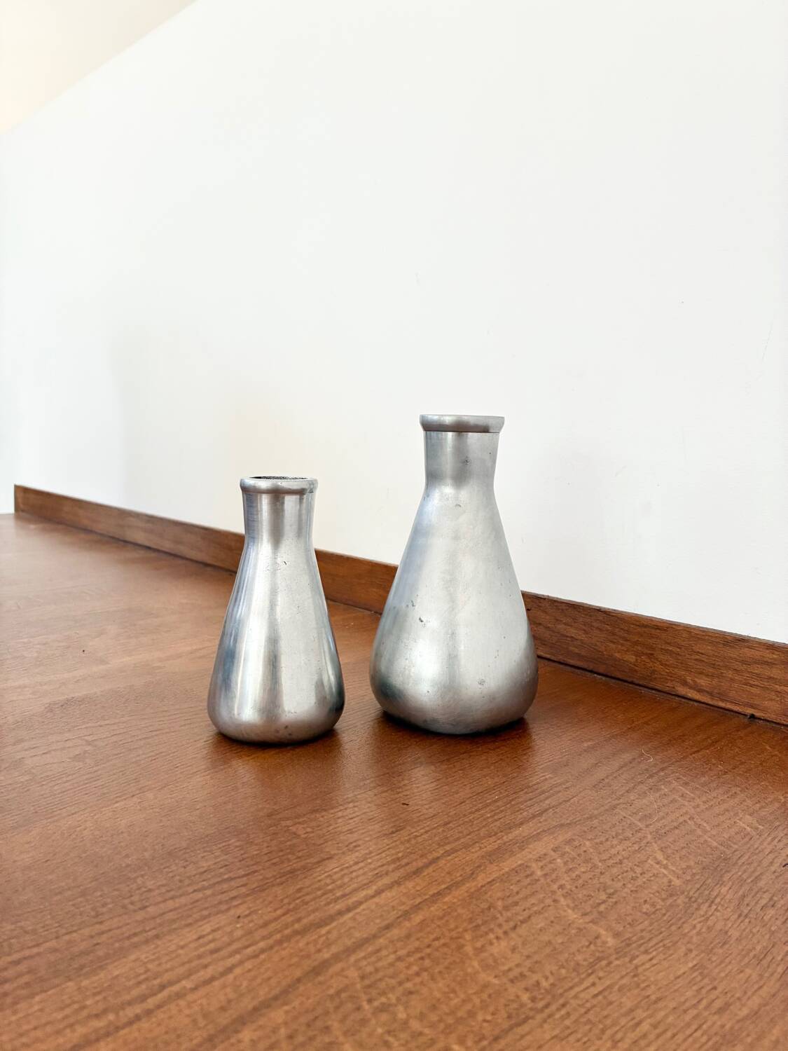 Vintage pair of chrome vases from the 1970s.