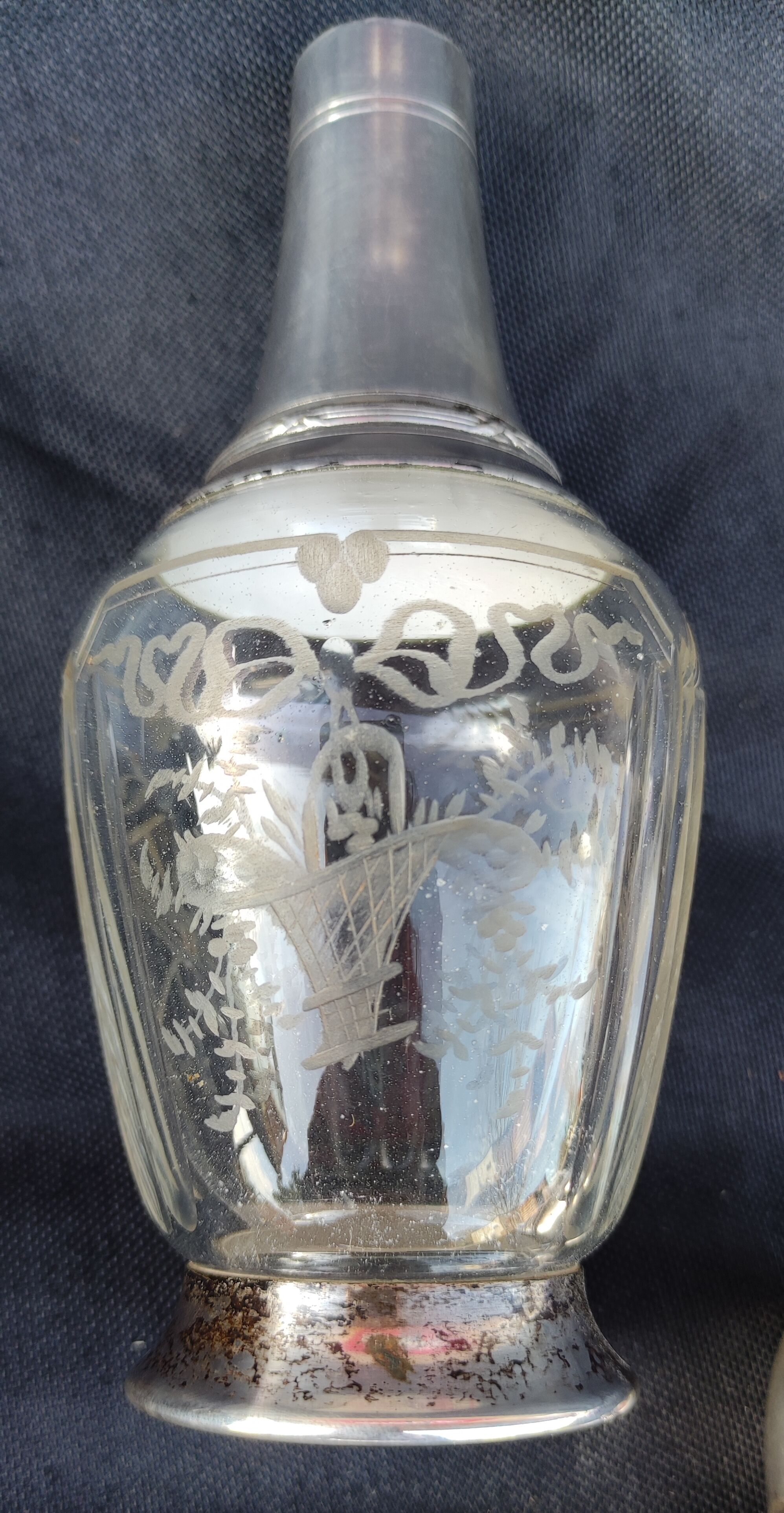 Old silver metal carafon