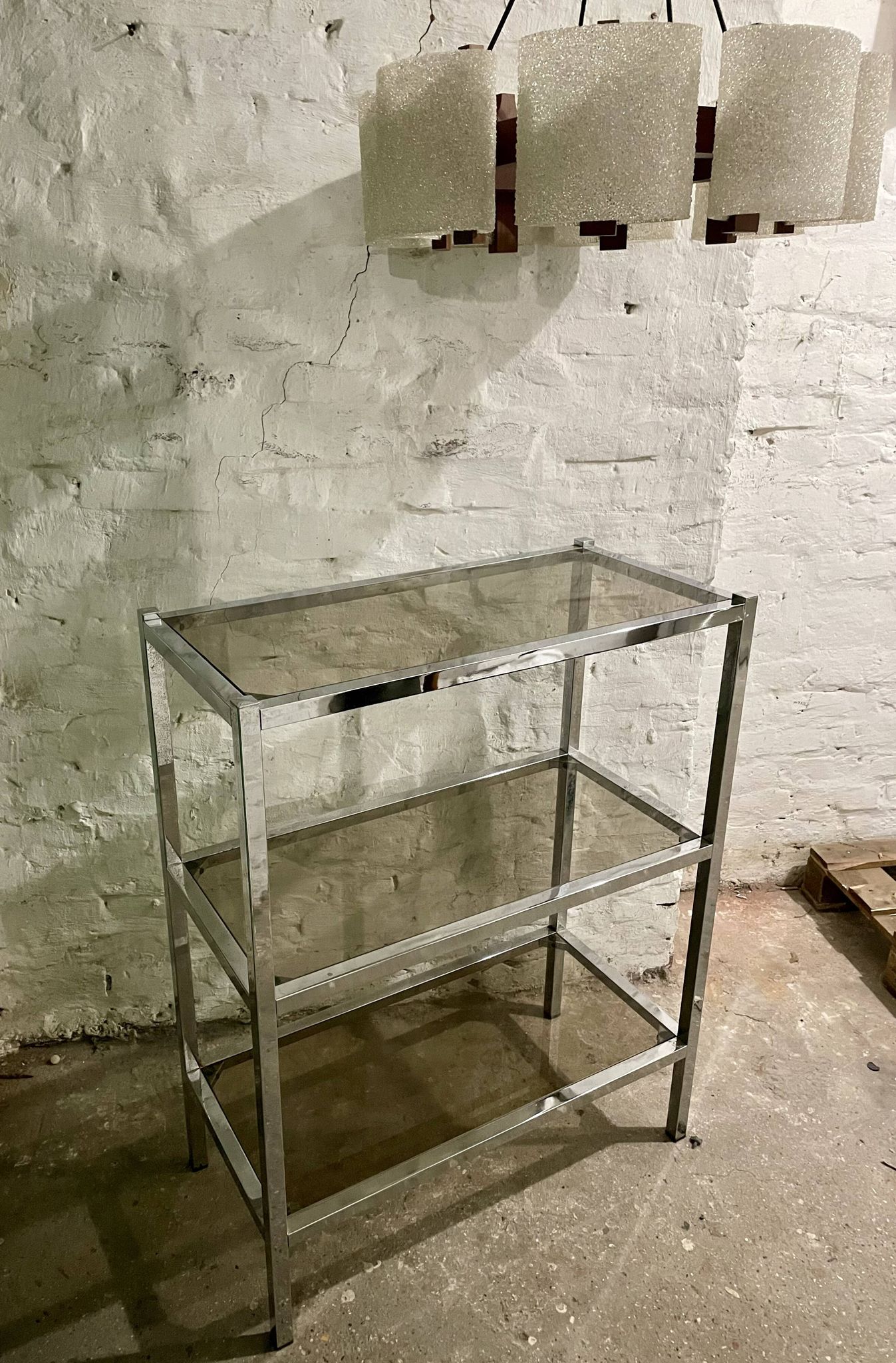 High chrome shelf with 3 smoked glass shelves Roche Bobois