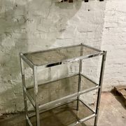 High chrome shelf with 3 smoked glass shelves Roche Bobois