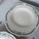 4 assiettes semi creuses terre de fer Longchamp