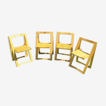 4 folding chairs in light wood