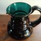 Deep green jug or pitcher with modern design - thick glass