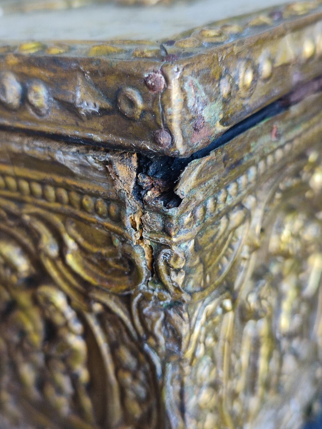 Old wooden box/casket covered with brass