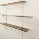 Large vintage wall shelf in smoked glass and white metal in String style.