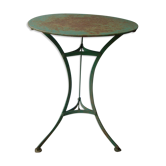 Old riveted metal garden pedestal