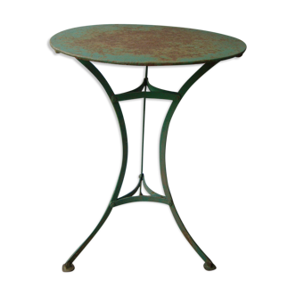 Old riveted metal garden pedestal