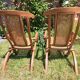 Pair of teak and cane deckchairs