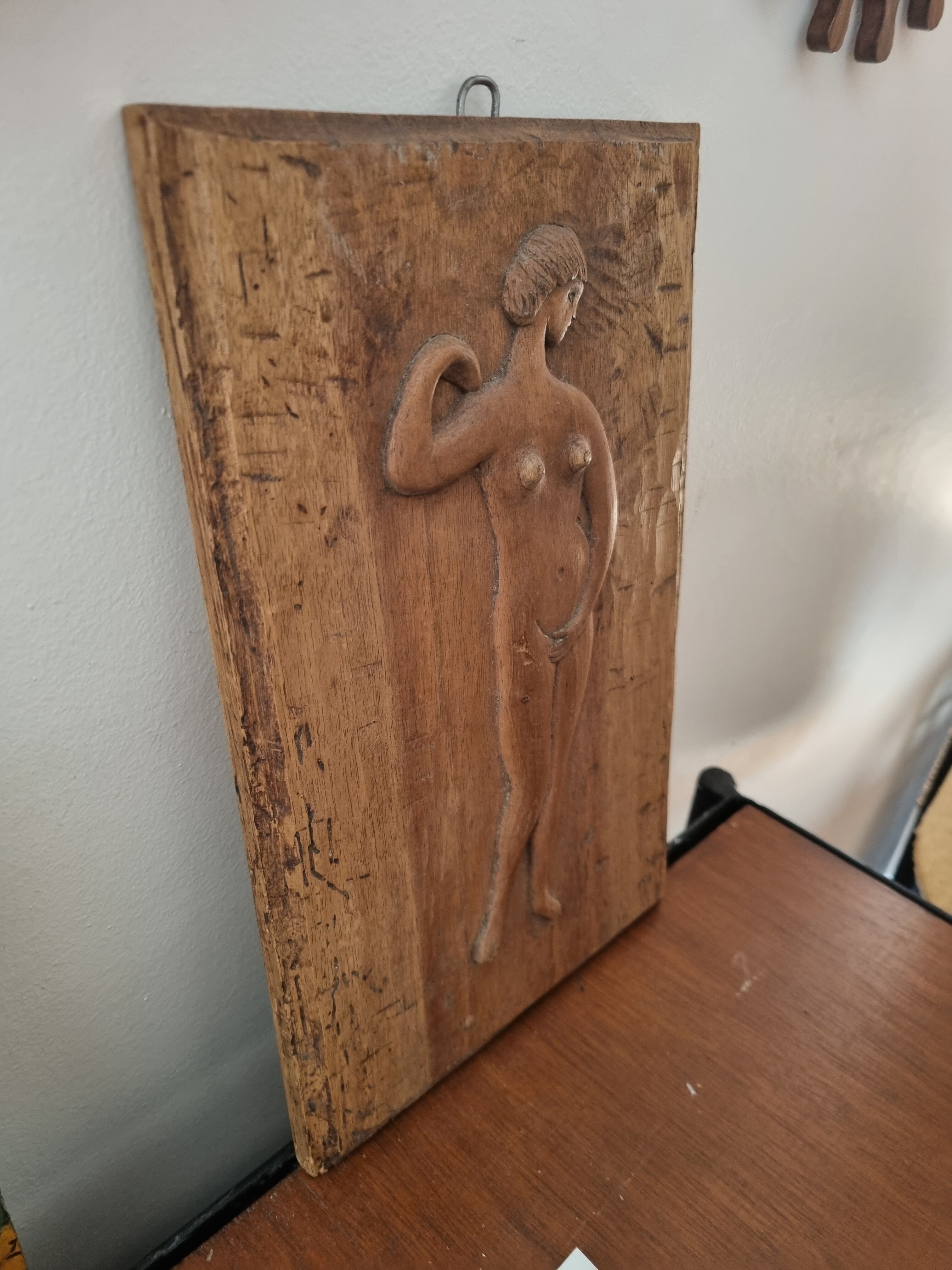Carved wooden panel