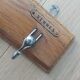 Tea towel holder, wooden and metal towel hook.