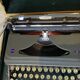 Triumph perfekt typewriter with its transport box.