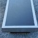 Coffee table in brushed steel and black tinted glass from the 70s