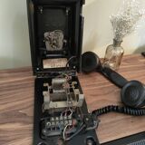 Old bakelite wall telephone