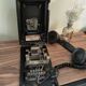 Ancien téléphone mural en bakélite