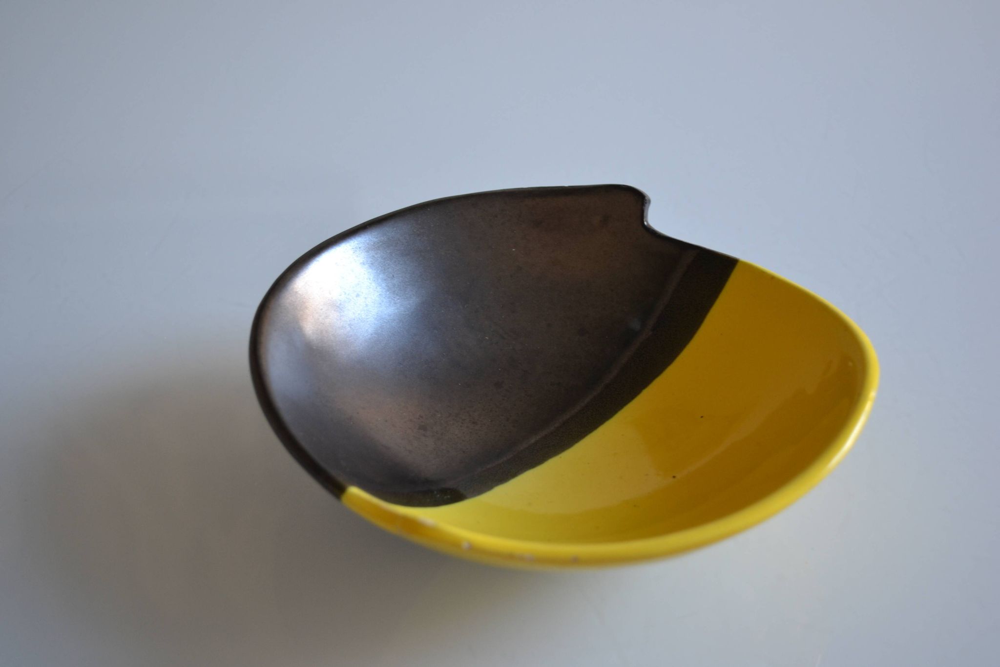 Bicolour ceramic cup in black and yellow signed Luc Vallauris 1950