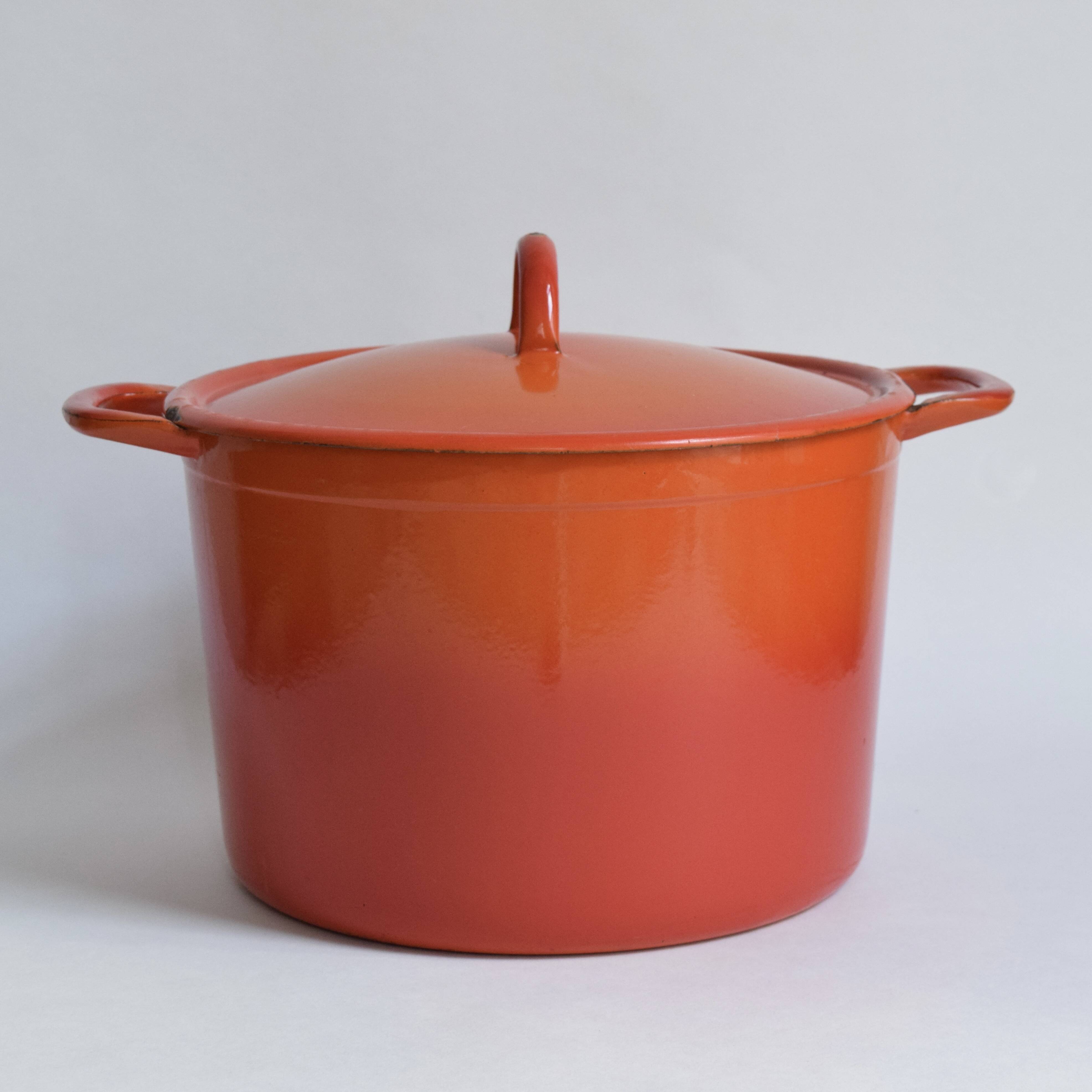 Large vintage saucepan or casserole dish in orange enameled cast iron