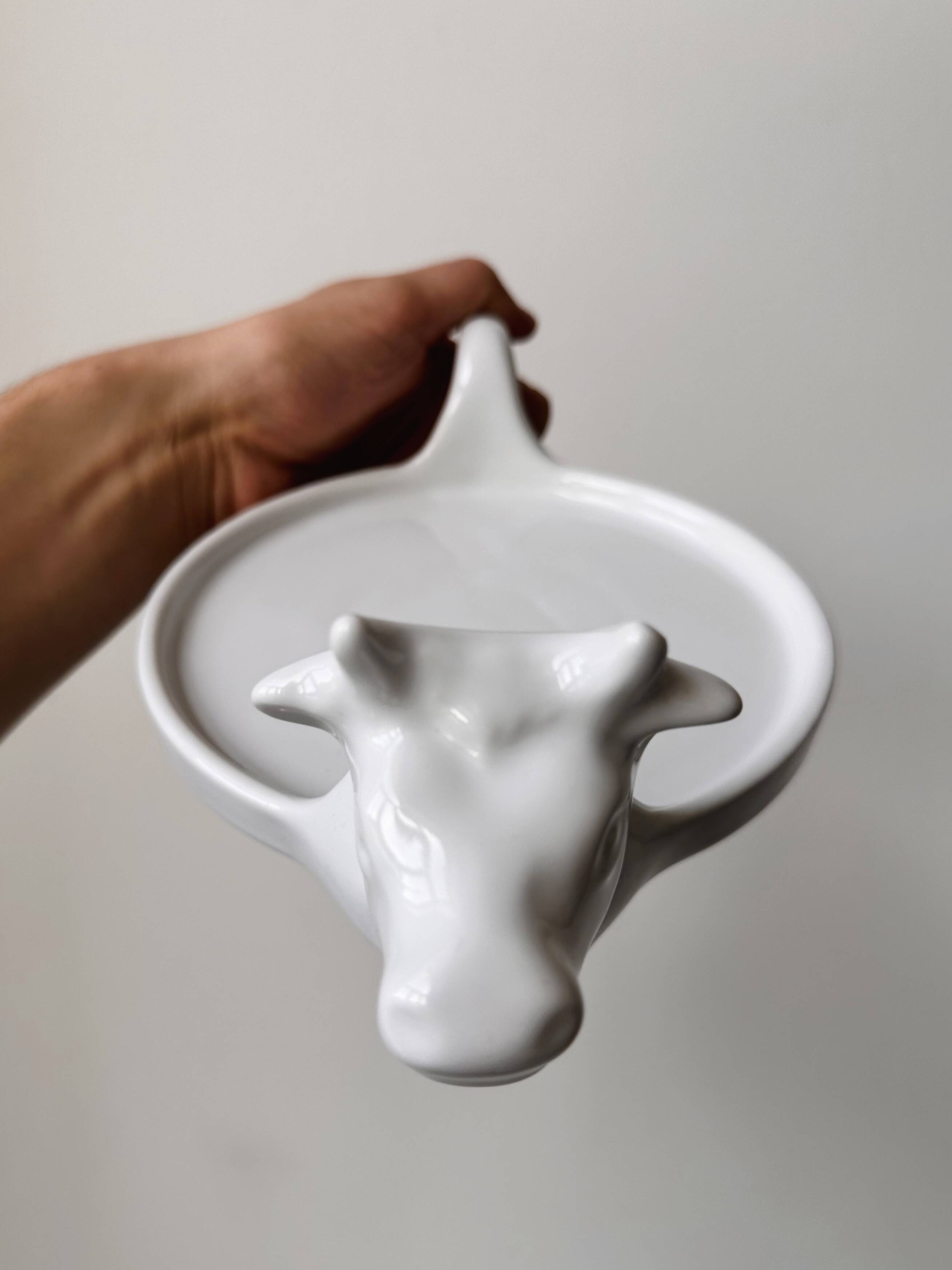 Revol porcelain cow cheese display