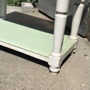 Rustic wooden dining table painted white and pale green, with a central drawer, 1950s.