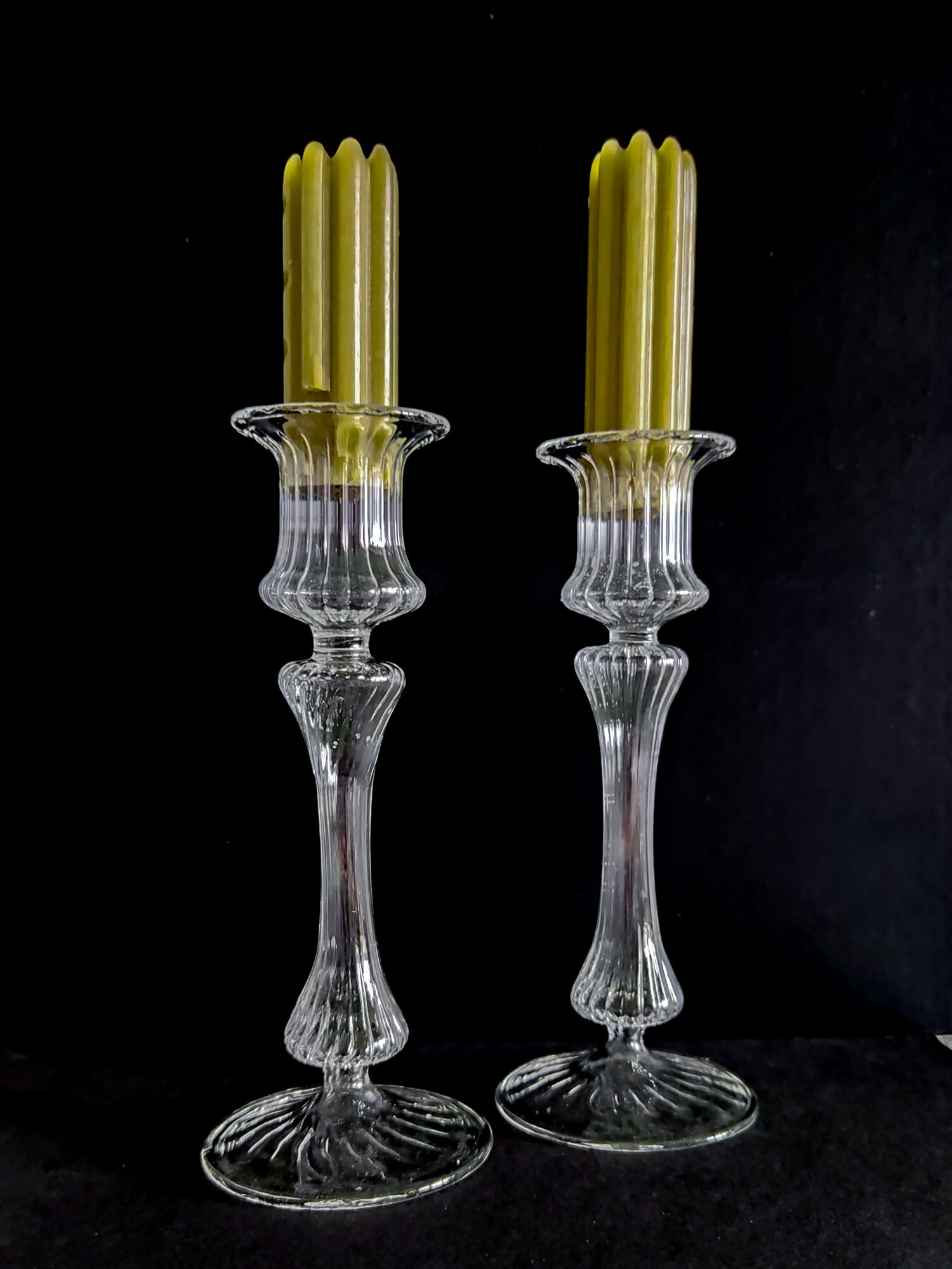 Pair of glass torch candlesticks