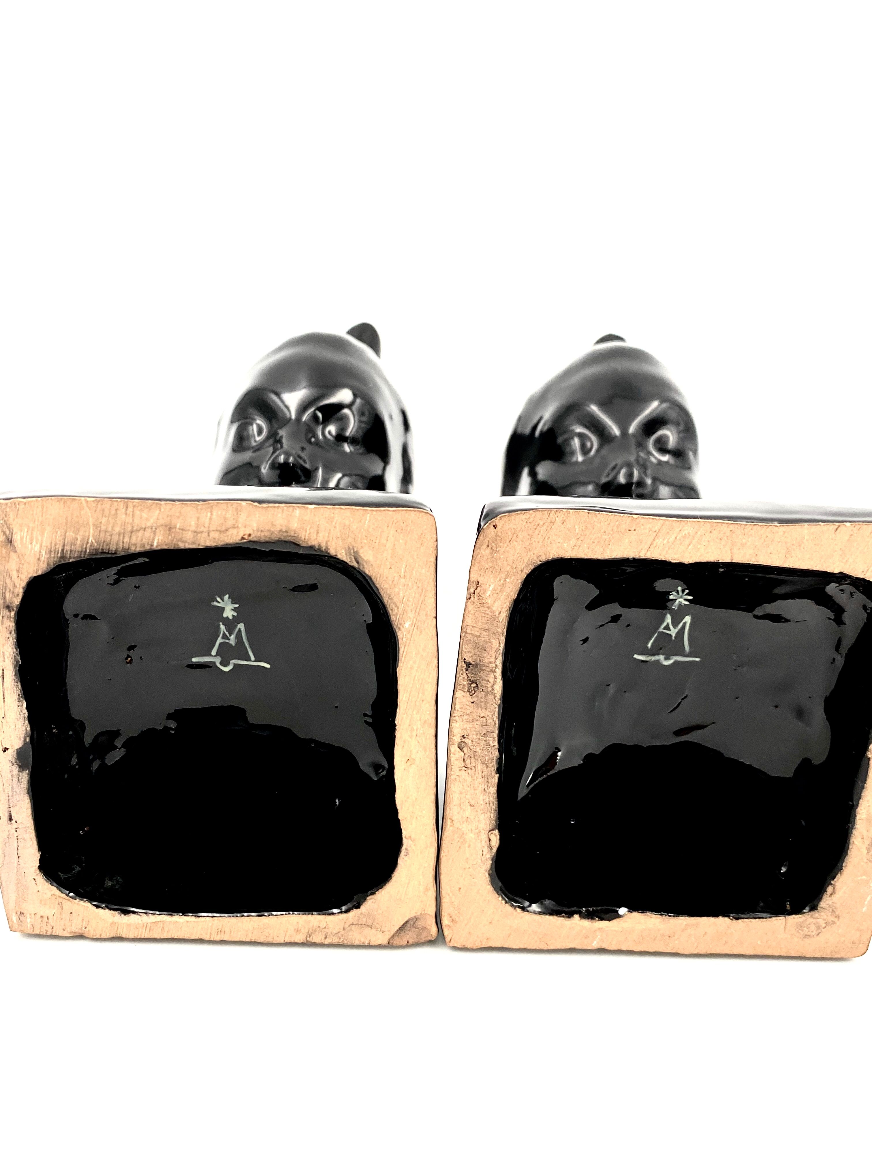 Angelo Minghetti, Art Déco black enamel Bookends, circa 1920, Signed