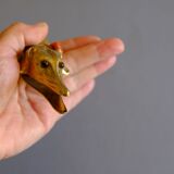 Ancient greyhound-headed mail clip, bronze