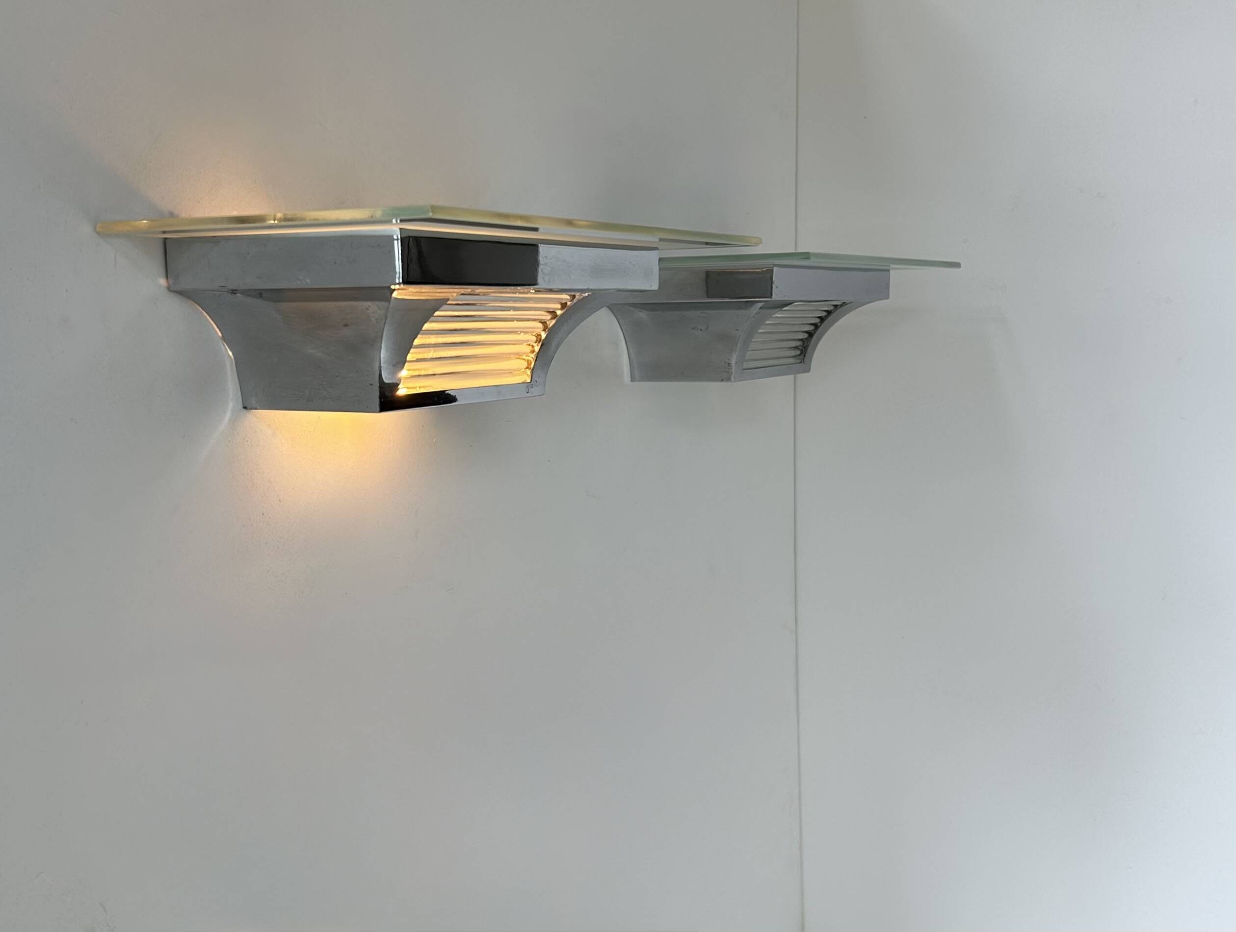 Pair of modernist Henri Petitot wall lights, chrome-plated brass, France, 1930