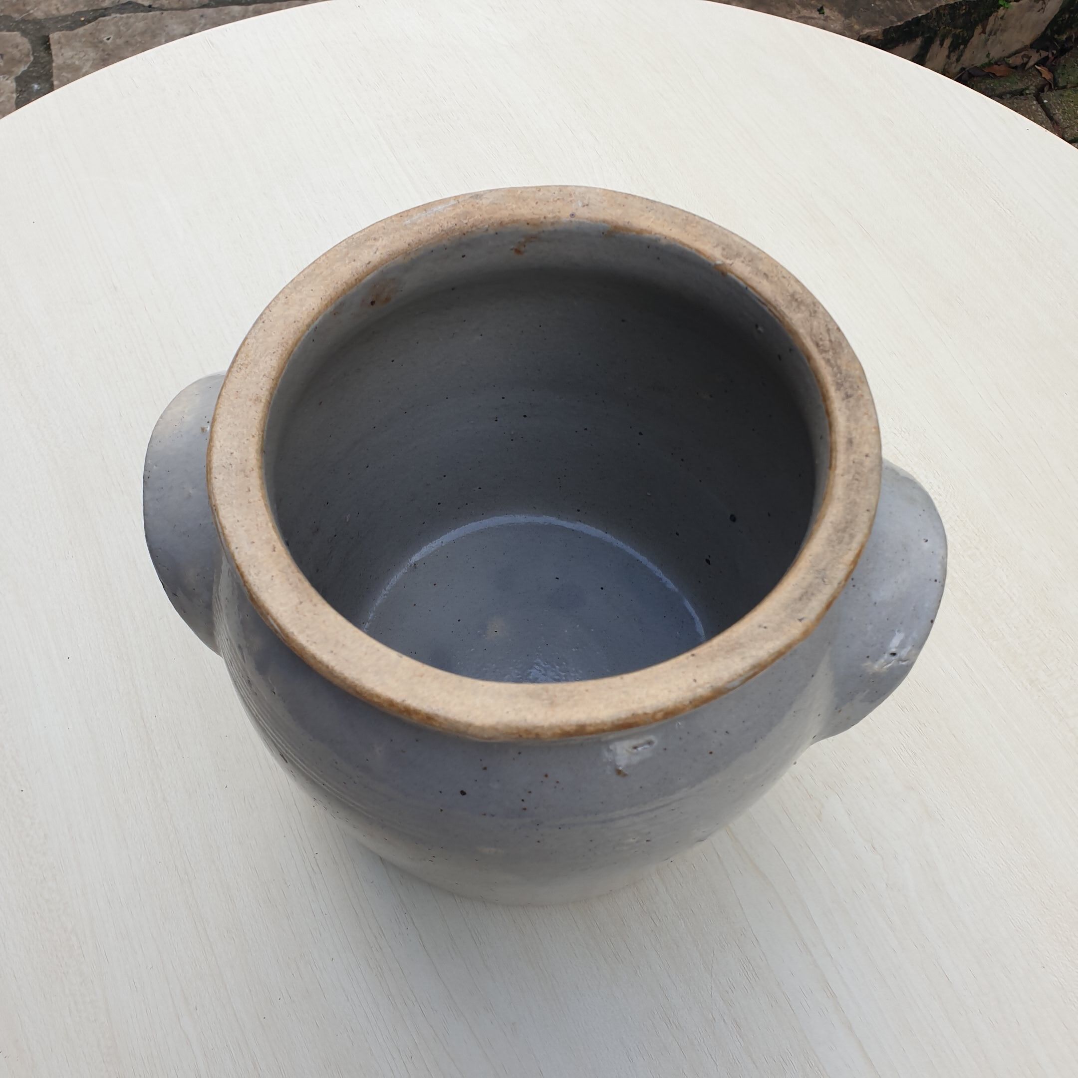 Enamelled pot in sleet