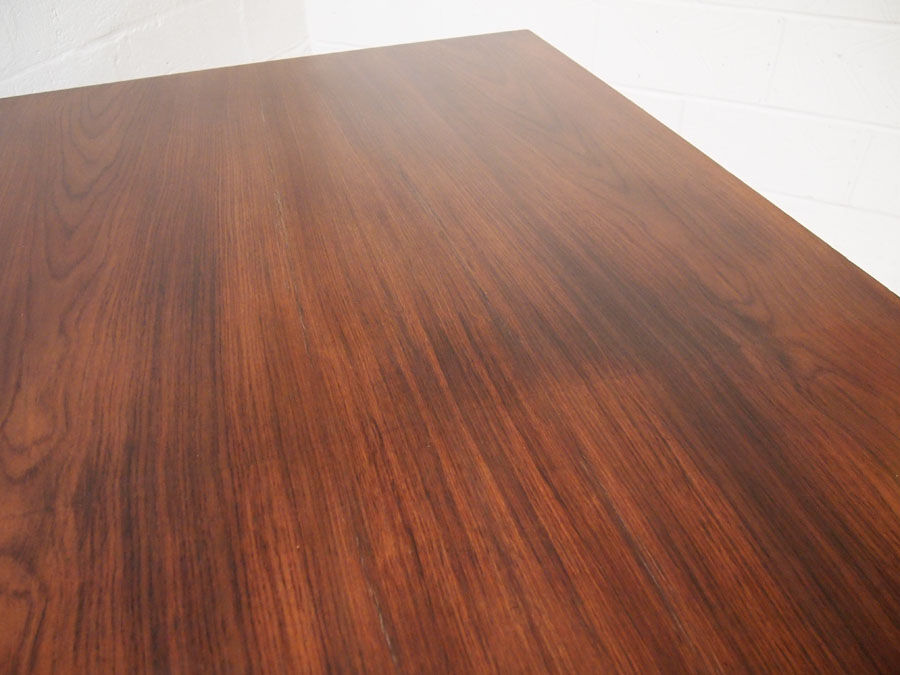 Midcentury danish rosewood dining table on bare steel box pin legs