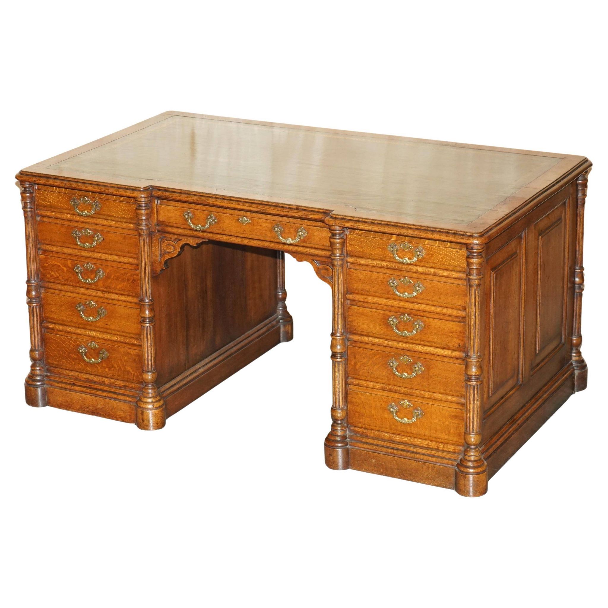Antique double-sided desk C Hindley & Son in oak and leather