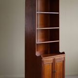 Rare high cabinet in teak by Martin Nyrop for Rud. Rasmussen, Denmark, early 20th century.