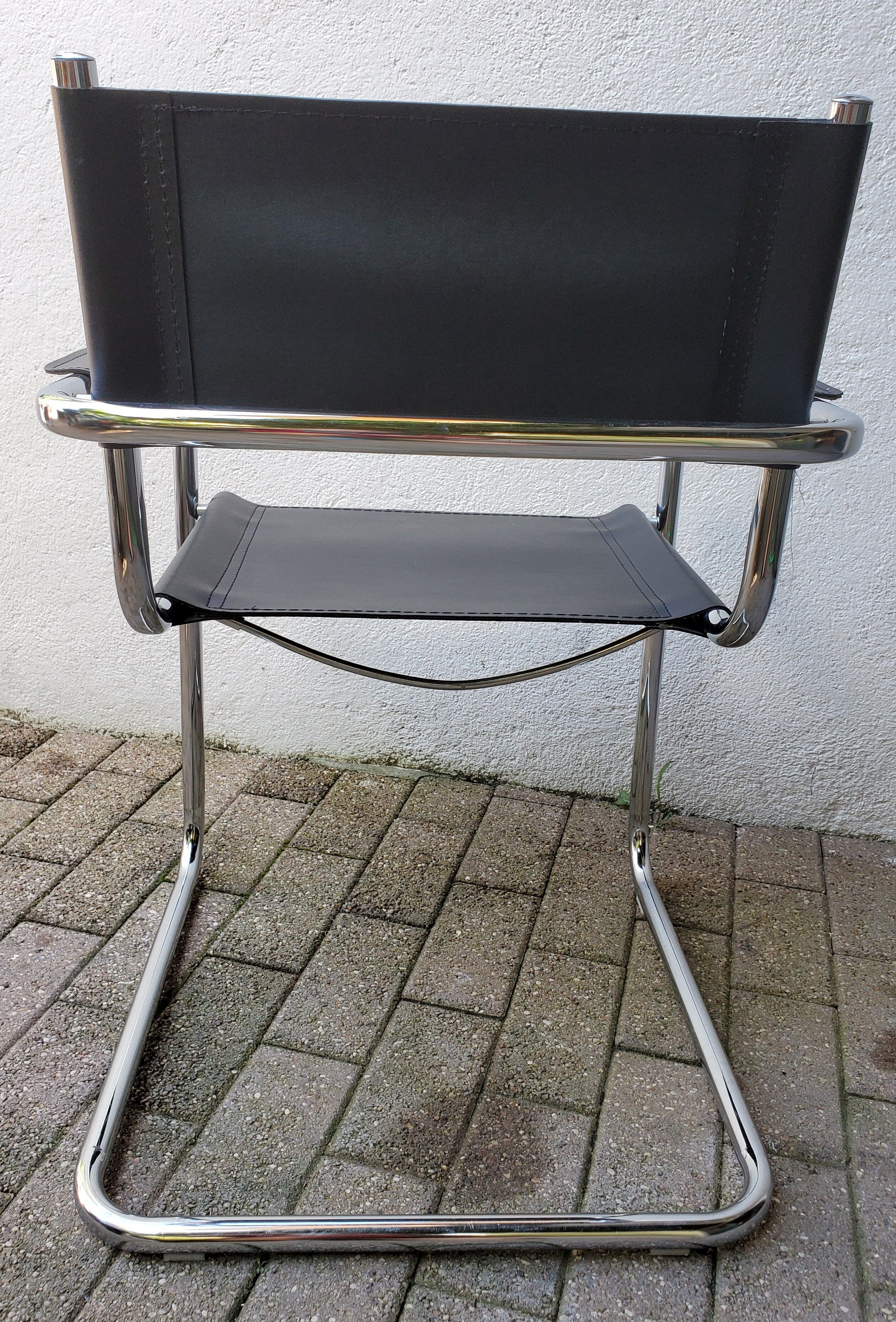 Leather and chrome armchair 70