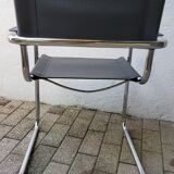 Leather and chrome armchair 70