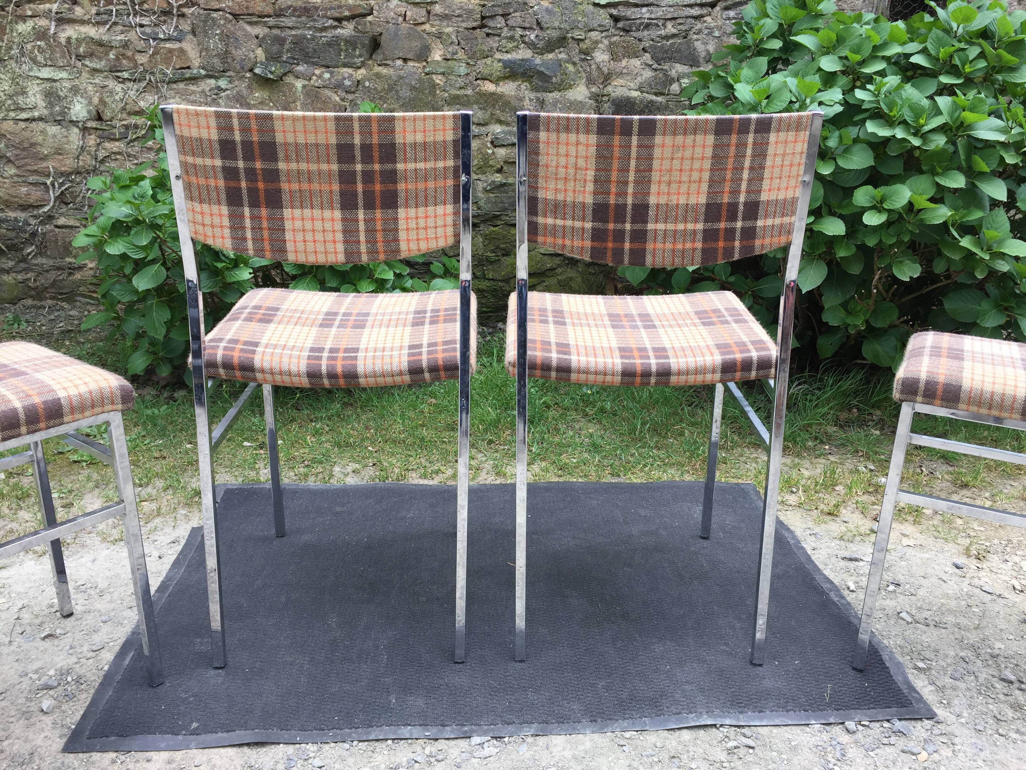 Vintage chairs and stools with chrome-plated square tubular metal base.