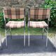 Vintage chairs and stools with chrome-plated square tubular metal base.