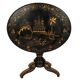 Large tilting pedestal table, black lacquered wood with a lively oriental landscape decoration.