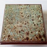 Old wood and ceramic trivet