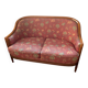 Art Deco style sofa, covered in Indian fabric with a pink background