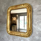 Antique gilded Louis-Philippe mirror, 19th century.