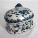 Old porcelain candy box with cracked effect