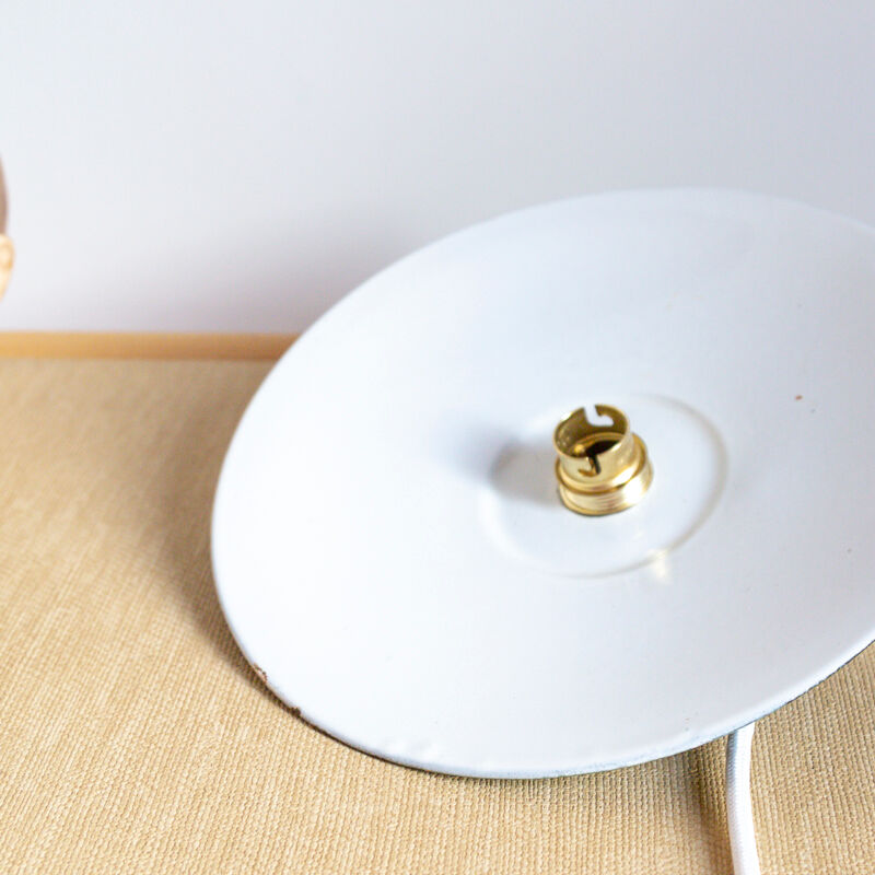 Suspension in green enamelled sheet metal